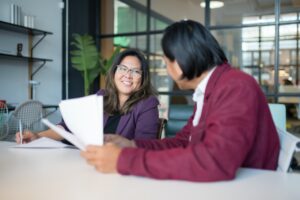 Woman smiling in conversation